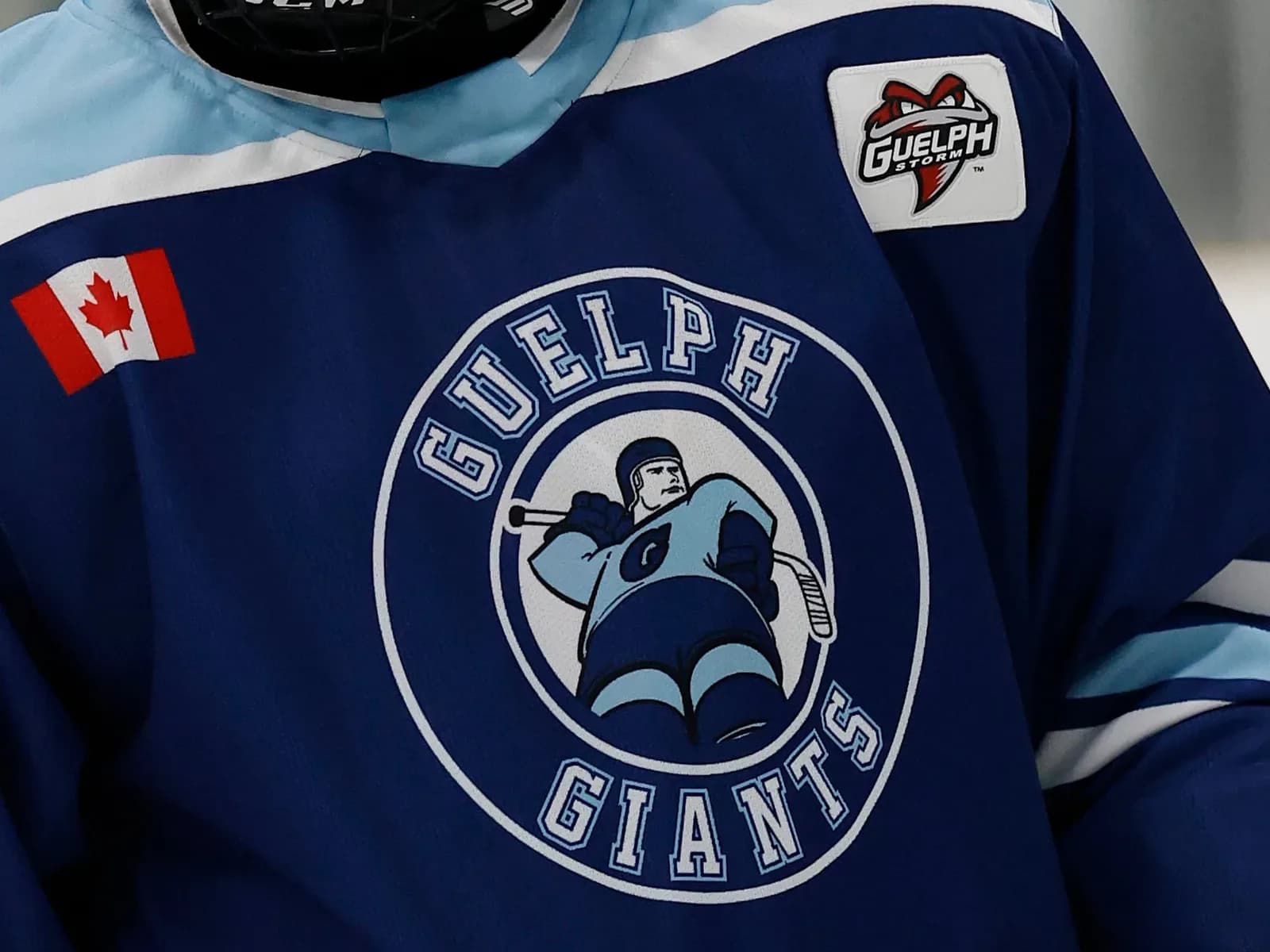 Close-up of the Guelph Giants crest on a blue team jersey